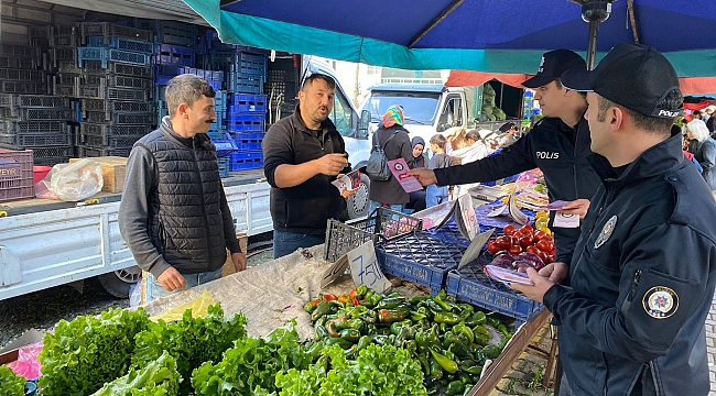 Pazarda broşürlü uyarı