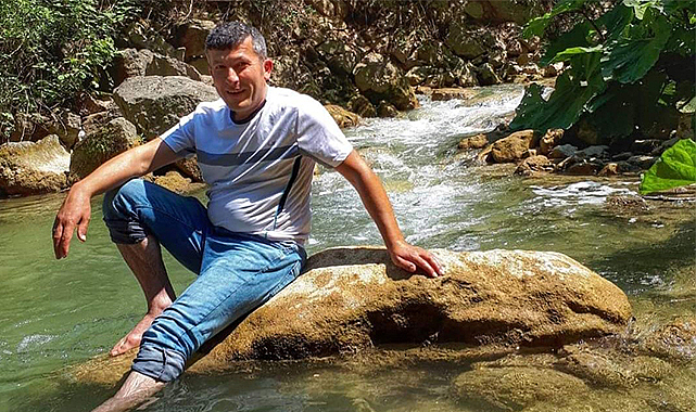 Oğlunu kurtarmak isterken boğulan baba defnedildi