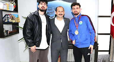 Feyzullah Dereci, şampiyonu ağırladı