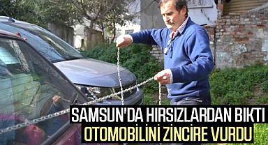 Samsun'da hırsızlardan bıkan esnaf, otomobilini zincire vurdu