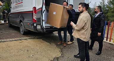 SAMGİAD 372 öğrenciye bot ve mont dağıttı