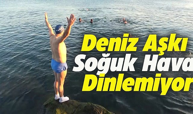 Samsun'da soğuk havaya aldırmadan denize giriyorlar