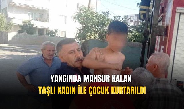 Yangında mahsur kalan yaşlı kadın ve çocuk kurtarıldı