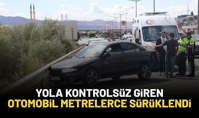 Yola kontrolsüz giren otomobil metrelerce sürüklendi