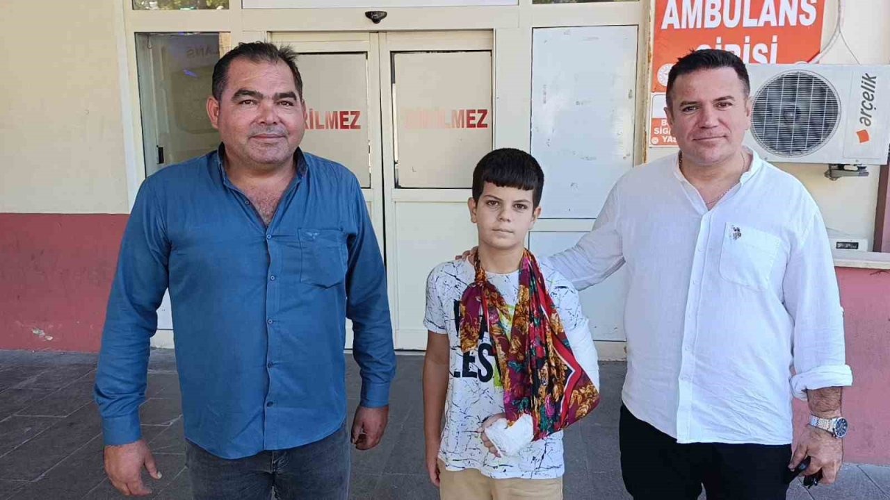 Düşüp kolunu kıran çocuğu aracına alıp hastaneye yetiştirdi