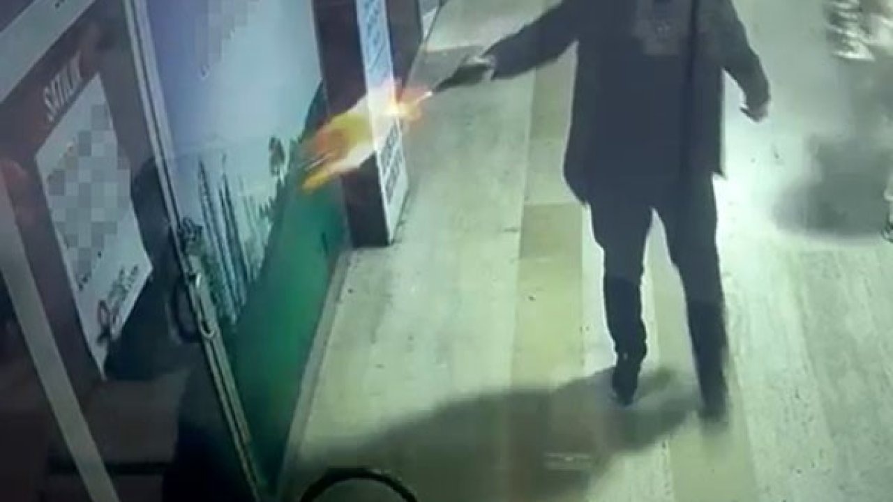 İşyerini mermi yağmuruna tuttu, elini kolunu sallayarak uzaklaştı