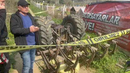 Devrilen traktörün altında kalan Mustafa Çoklu can verdi